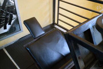 Close Up of a Black Leather Gym Bench