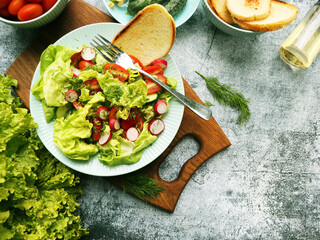 Fresh vegetable summer colorful salad. Vegetarian food. Top view.