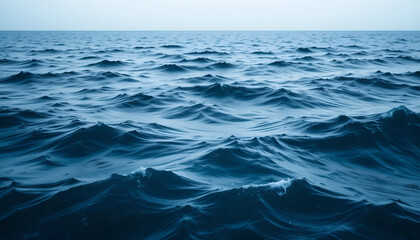 Fototapeta premium Dark Ocean Surface with Choppy Blue Waves and Horizon