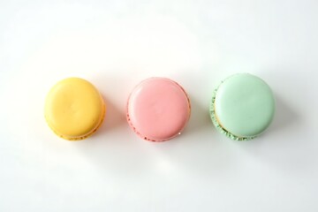 Obraz premium Colorful macarons pastel dessert french confectionery almond meringue cookies sweet treat baking gourmet food 