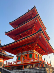 Closeup and lookup view ancient red wooden pagoda of the Kiyomizu-dera temple in Kyoto, Japan