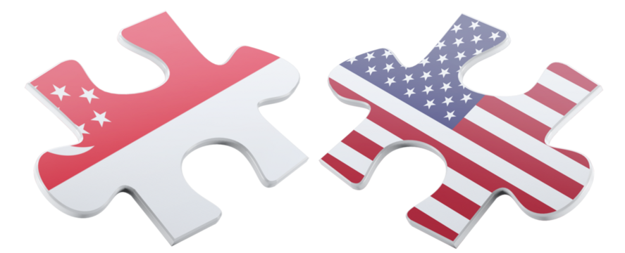 Two puzzle pieces, adorned with the flags of Singapore and the United States, symbolize a partnership or alliance in a glossy, three-dimensional, conceptual design.
