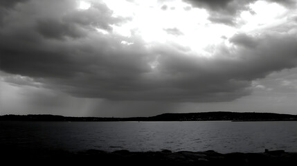 Monochrome seascape under dramatic sky