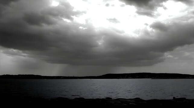 Monochrome seascape under dramatic sky