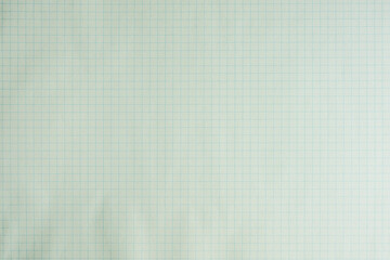 方眼紙のノート　薄い水色のグリッド入りのシンプルな背景素材