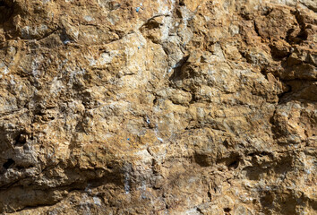 the structure of the rock surface in the section, quarrying in the natural environment, sunny day