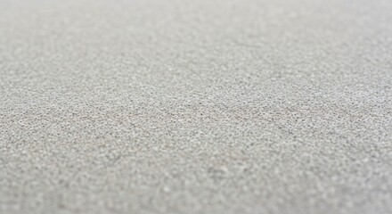 A close up shot of a grainy surface with a shallow depth of field creating a blurred background effect