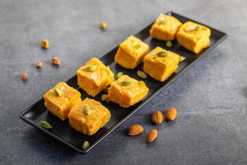 Soan Papdi is a flaky, sweet Indian dessert made with gram flour, sugar, ghee, and cardamom, known...