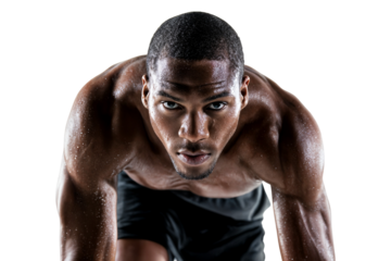 Focused male sprinter in starting position ready to race showing muscular physique isolated on transparent background