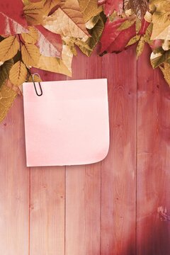 Fototapeta Autumn leaves with yellow note