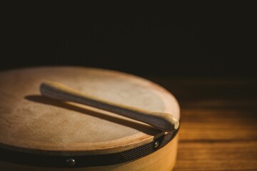 Close-up of wooden stick on bodhran