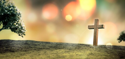 Flat design is depicting wooden cross standing on grassy hill under golden sky with bokeh orbs