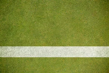 Gordijnen Thick horizontal white painted line is running across green grass turf in flat vector illustration © vectorfusionart