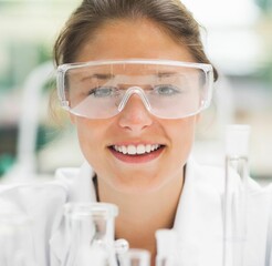 Female scientist smiling at camera