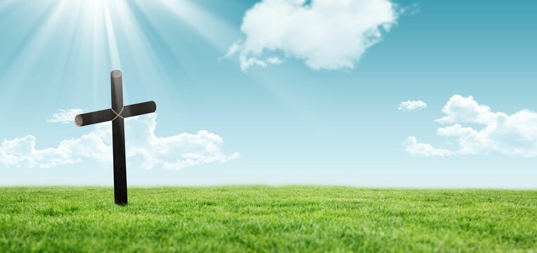 Fototapeta Flat vector wooden cross standing in lush meadow, sunlight streaming through clouds