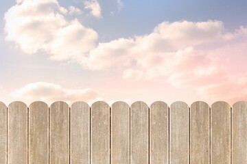 Purple sky over a wooden fence