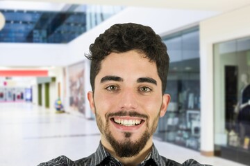 Portrait of smiling man at mall