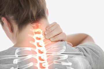 Highlighted spine of woman with neck pain