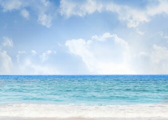 Flat design seascape is showing white sandy beach with turquoise waves under cumulus clouds