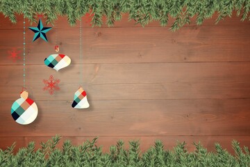 Christmas decorations over wooden planks