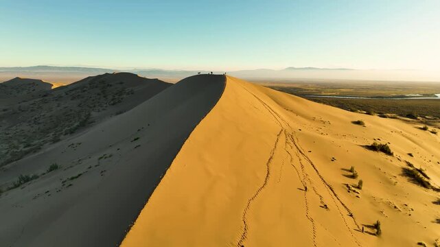 Singing Dune in Altyn Emel National Park, Kazakhstan at sunset