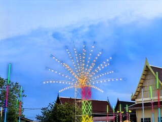 Illuminated Starburst Lights at Thai Temple Festival Dusk