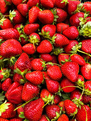 Texture of sweet fresh strawberries as background, closeup
