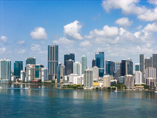 Aerial view of Brickell skyscrapers. Modern cityscape of downtown Miami. Panoramic Miamis skyline above the coastline. Brickell Key aerial view in Miami. Landscape of Miami. Miami Beach and Brickell.