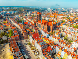 Gdansk with Motlawa river in Poland. Aerial landscape of the Main Town. Old town colourful house with saint Marys church