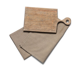 Wooden cutting board and grey napkin on white background