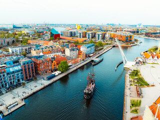 Gdansk with Motlawa river in Poland. Aerial landscape of the Main Town. Old town colourful house with saint Marys church