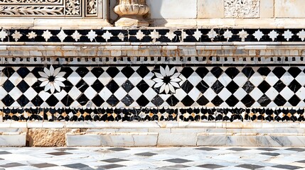 Intricate Black and White Geometric Tile Mosaic on Marble Surface