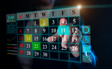 A man points his finger at the date of July 4, US Independence Day, on a virtual calendar