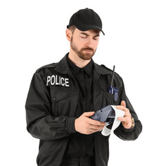 Male police officer issuing traffic fine with payment terminal on white background