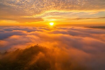 Obraz premium Sunrise over misty mountains