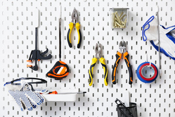 Working tools hanging on peg board