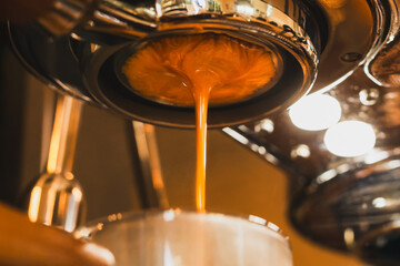 Close up of Espresso machine making an fresh espresso with a portafilter.
