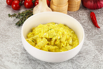 Italian cuisine - yellow risotto with chicken