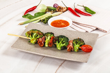 Thai Street foof satay with bacon and broccoli