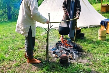 Medieval Tent Life: Fire and Food.  Traditional Outdoor Cooking with Iron Cauldron