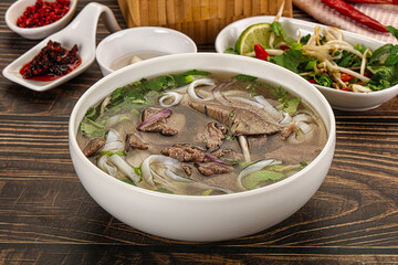 Vietnamese Pho Bo soup with beef and noodles