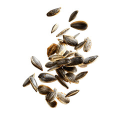 Roasted sunflower seeds falling on black background
