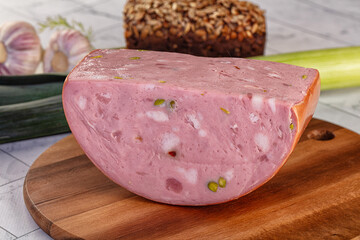 Italian Mortadella pork sausage piece