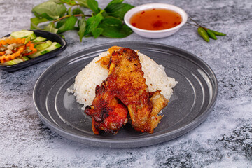 Spicy roasted chicken wing with rice