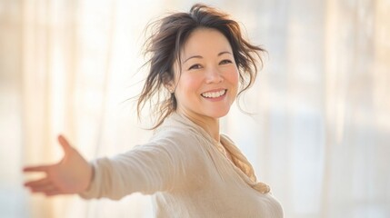 Happy woman opening arms and smiling at home