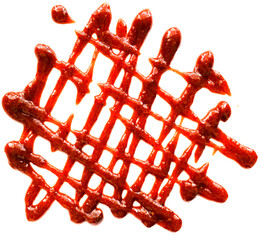 A decorative pattern made of a red sauce, resembling a lattice design.