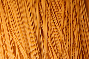 Vertical Whole Wheat Spaghetti Texture Isolated on White Background
