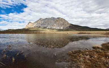 Mountain behind lake on Dalton Highway