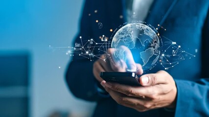 A person interacts with a smartphone displaying a holographic projection of a globe connected by digital network lines - Powered by Adobe