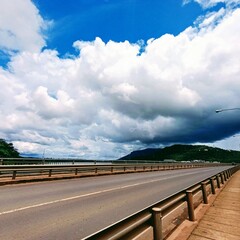 The majestic Lao-Japan Friendship Bridge (built 2000) spans the Mekong River in Pakse, Laos - 23...